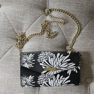 Trina Turk Black Floral Crossbody Bag.